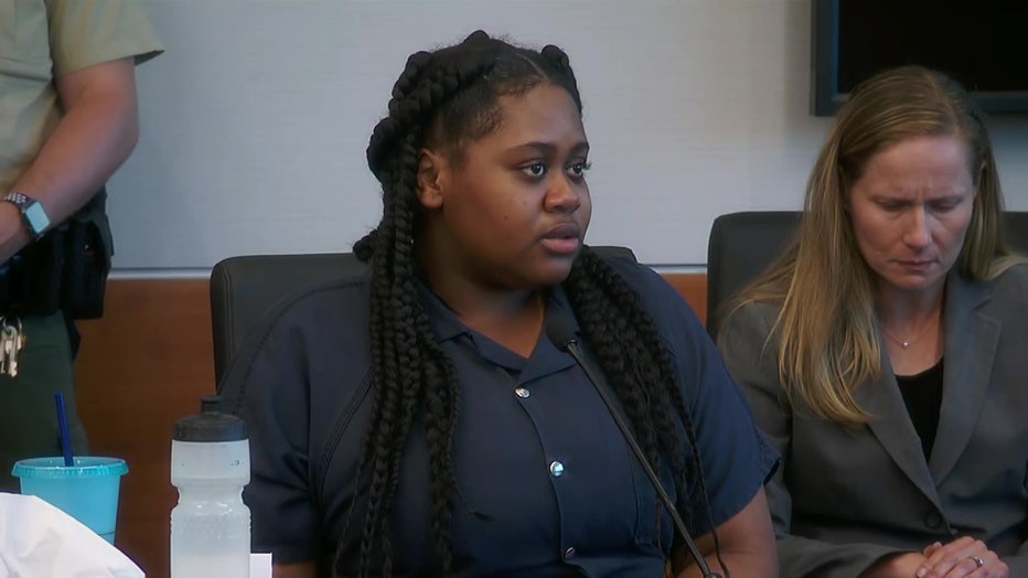 Photo: Pieper Lewis, the Iowa teenage human trafficking victim who stabbed her rapist to death, speaks in court during her sentencing. A judge ordered her to pay $150,000 in restitution to the man's family.