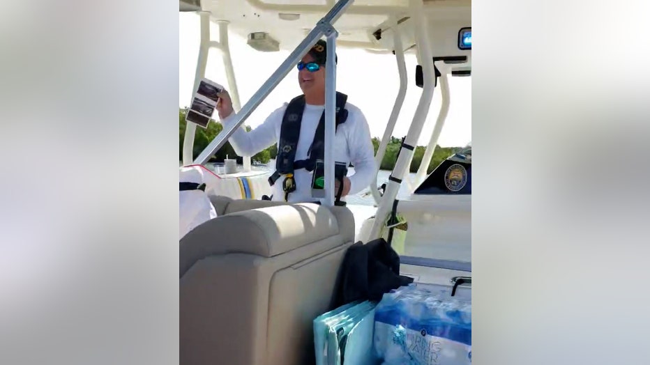 venice pd officer joyce holds up ultrasound