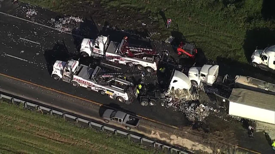 Photo: Aerial view of tractor-trailers involved in I-75 crash that led to beer cans and boxes spilled into roadway.