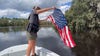 Florida deputies rescue American flag from swollen river after Hurricane Ian