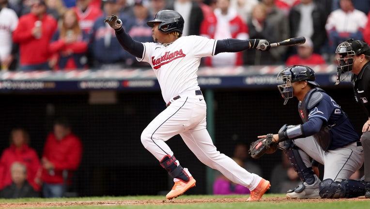 Jose Ramirez #11 of the Cleveland Guardians hits a single in the 8th inning against the Tampa Bay Rays in game one of the Wild Card Series at Progressive Field on October 07, 2022 in Cleveland, Ohio.