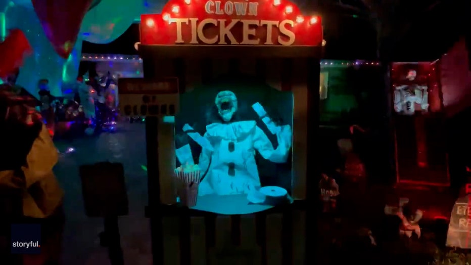 A cackling clown inside a "ticket booth" at the Clearwater home. 