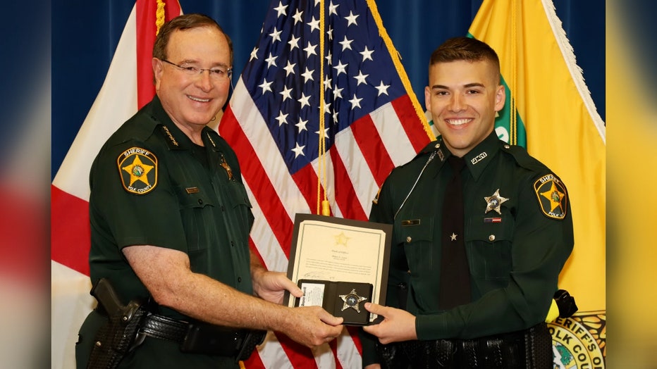 Photo of Polk County Sheriff Grady Judd and Deputy Blane Lane