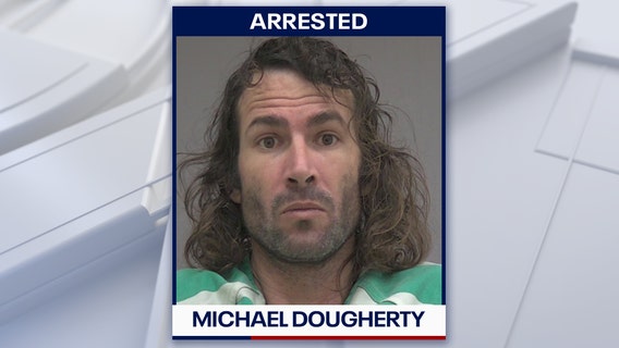 Man arrested after woman rushed to the hospital with hatchet protruding from head, deputies say