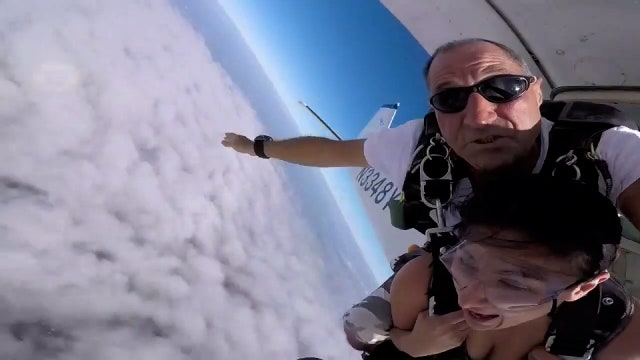 Tandem skydivers serve as both thrill-seekers and therapists while thousands of feet above the ground