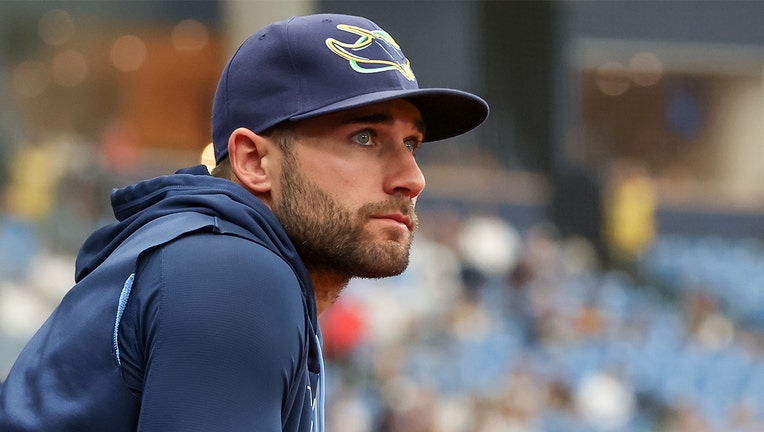 Kevin Kiermaier #39 of the Tampa Bay Rays looks on from the bench as his team takes on the Tampa Bay Rays during a baseball game at Tropicana Field on September 25, 2022 in St. Petersburg, Florida. It is Kiermaiers last home game for the Rays.