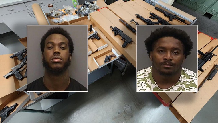Zavid Hill Roland Fletcher were arrested and police seized 23 guns and narcotics while investigating a suspected drug dealer. Photos are courtesy of the Tampa Police Department.