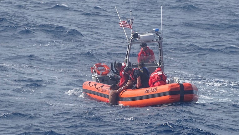 Coast Guard crews rescue a migrant who survived after their vessel capsized about 50 miles off the Florida Keys.