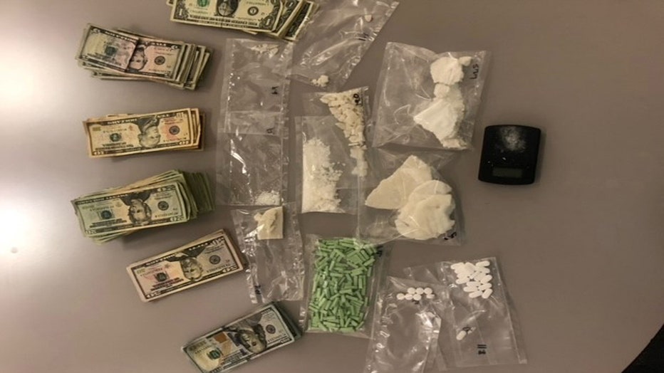 Officers found illegal drugs and more than $4,000 in cash inside the motel room.