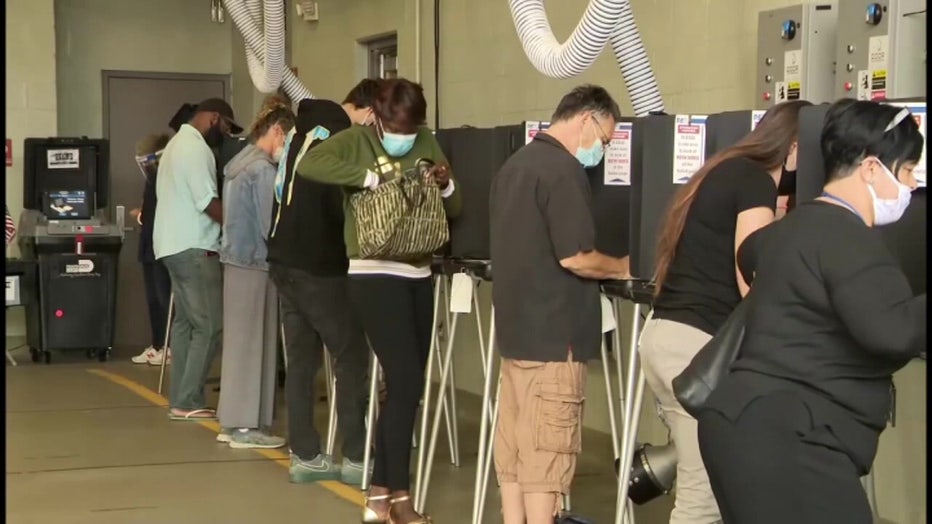 Voters casting ballots. 