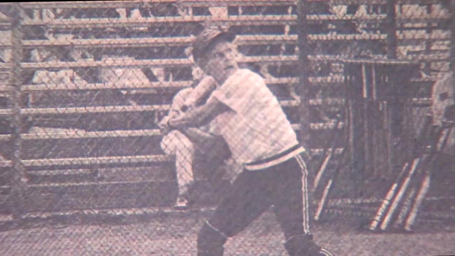 Old photo of Ethel Lehmann playing softball. 
