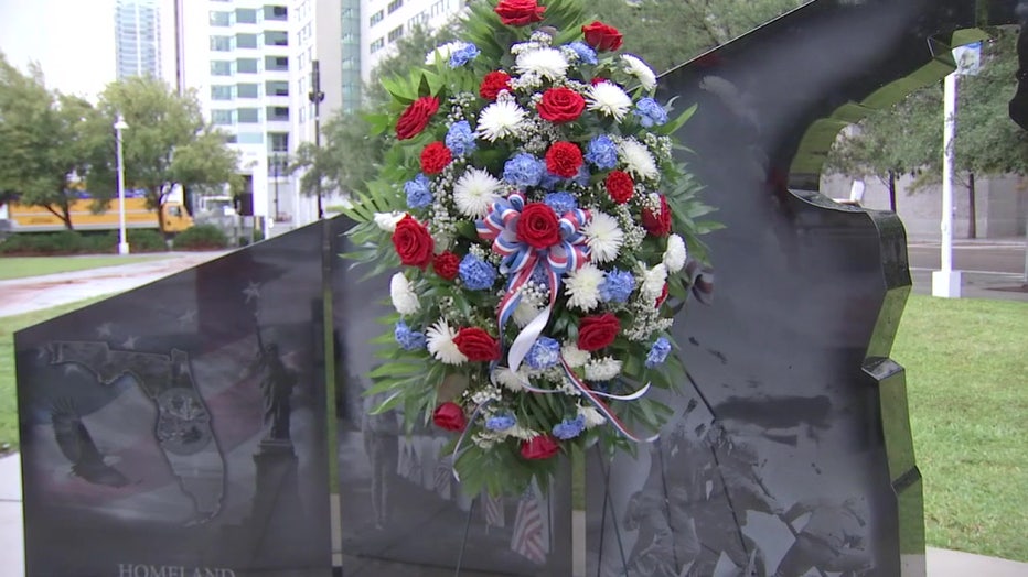 A wreath was laid indoors by the flag and later moved out to MacDill Park once the rain cleared.
