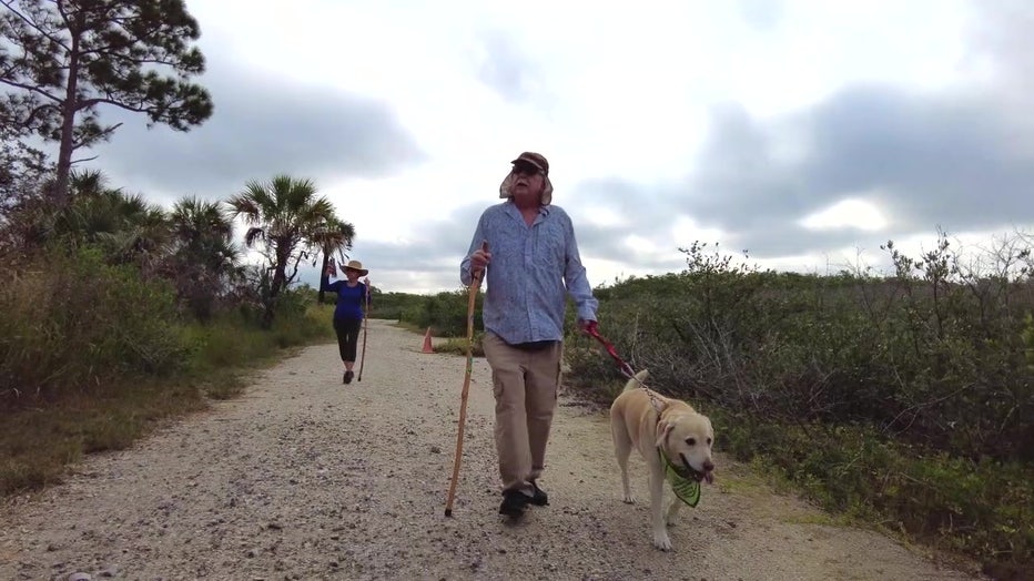 Daniel Norris enjoys hiking with his wife and dog.