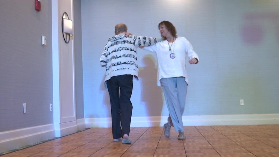 A couple dances to the sound of smooth jazz during the Suncoast Jazz Festival. 