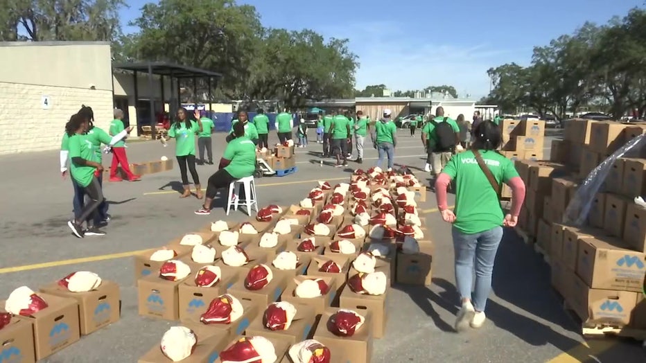 Volunteers passed out 500 meal boxes on Saturday, with a goal to give out 2,500 boxes throughout the holiday season.