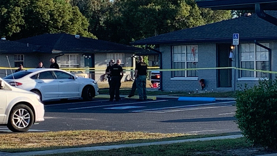 Pasco deputies remained at the New Port Richey home after sunrise where a deadly shooting occurred.