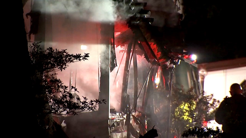 Photo: Smoke rising from damaged mobile home in Riverview after fire broke out.