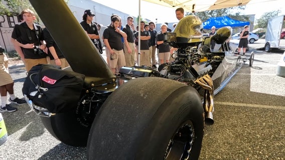 Race car driver exposes Pepin Academy students to world of possibilities