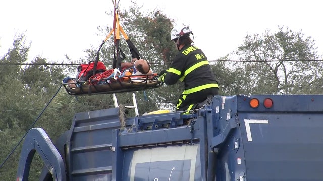 Man rescued from Tampa garbage truck after he was likely sleeping in dumpster, police say