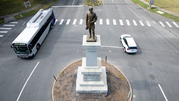 A statue of Confederate general A.P. Hill stands above his grave at an intersection of W. Laburnum Ave. and Hermitage Road July 20, 2022 in Richmond, Virginia.