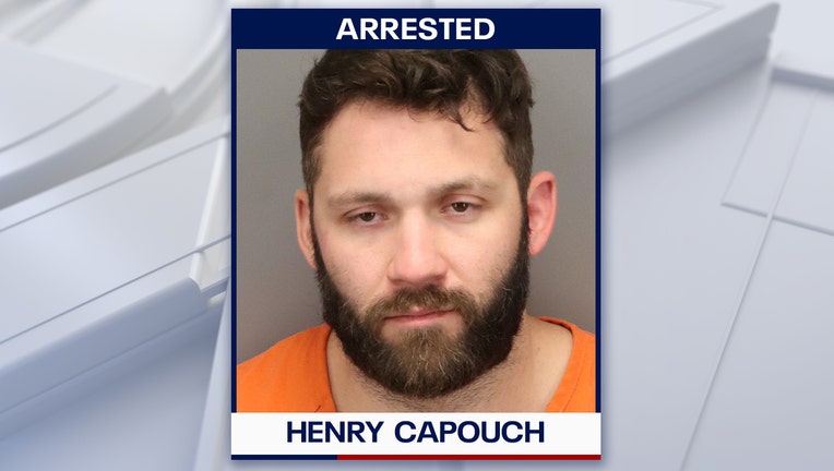 Mugshot of Henry Capouch
