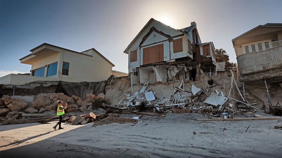 Gutted homes north of Toronita Avenue Beach Park in Wilbur-By-The-Sea, Florida, Friday, Dec. 2, 2022. The southern Volusia coastline was devastated by significant beach erosion from Hurricane Ian and Tropical Storm Nicole, causing millions in damage to oceanfront properties.