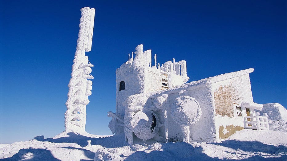 An observatory is covered with heavy snow atop Mount Washington in the White Mountains of New Hampshire. (Photo by Christopher J. Morris/CORBIS/Corbis via Getty Images)