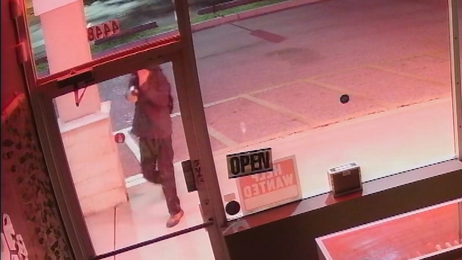 armed burglar sarasota vape shop