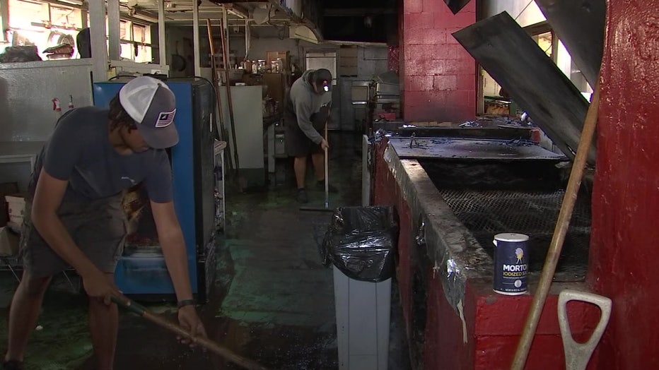Employees spent Friday morning cleaning up after a fire.