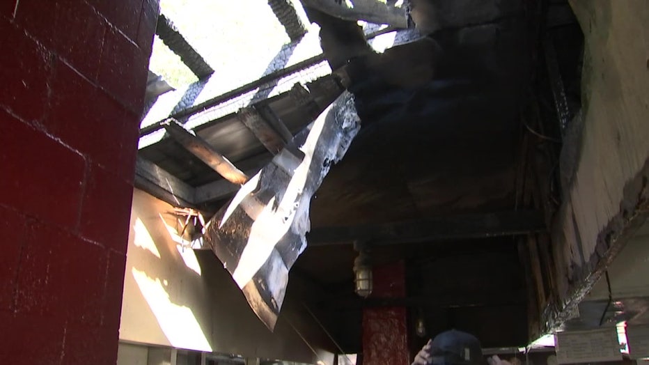 The fire tore through the roof of Peebles BBQ.