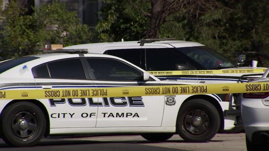 Police outside a Tampa Family Dollar after a man's body was found Sunday morning, 