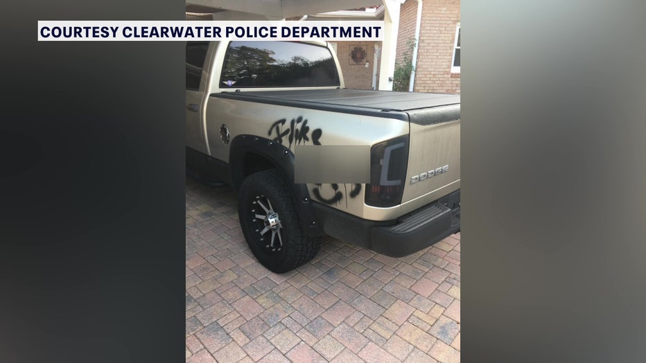 Two teens are accused of spray painting hate-filled messages on vehicles. 