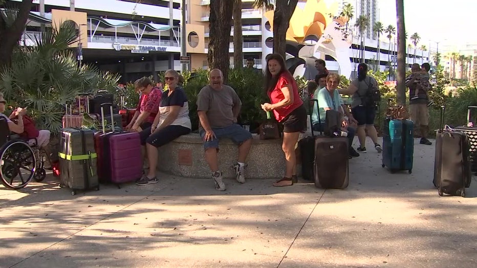 Travelers wait to board a cruise in Tampa.