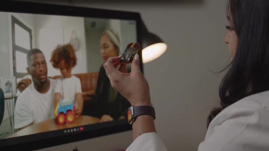 A doctor conducts a virtual autism screening.