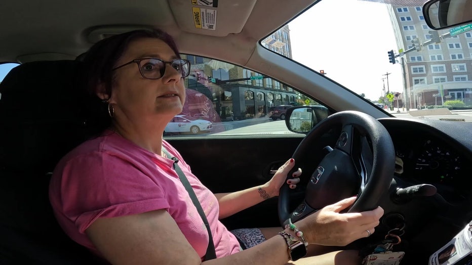 Rachelle Arnold about to pick up a student to take him to the airport.