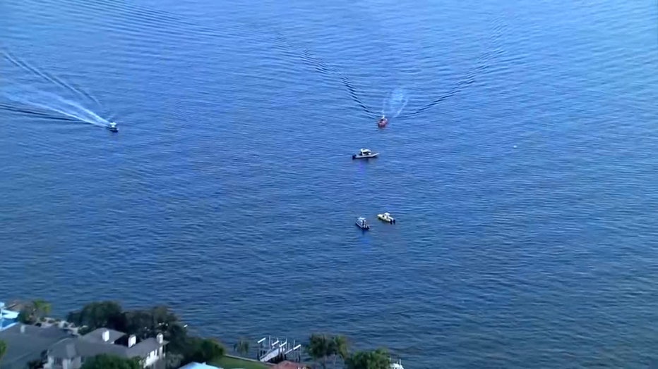 A helicopter with four people on board crashed off Davis Islands Thursday evening.