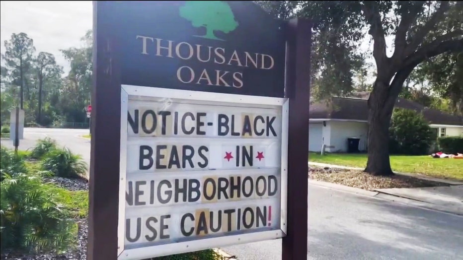 Sign warns neighborhood of Florida black bear