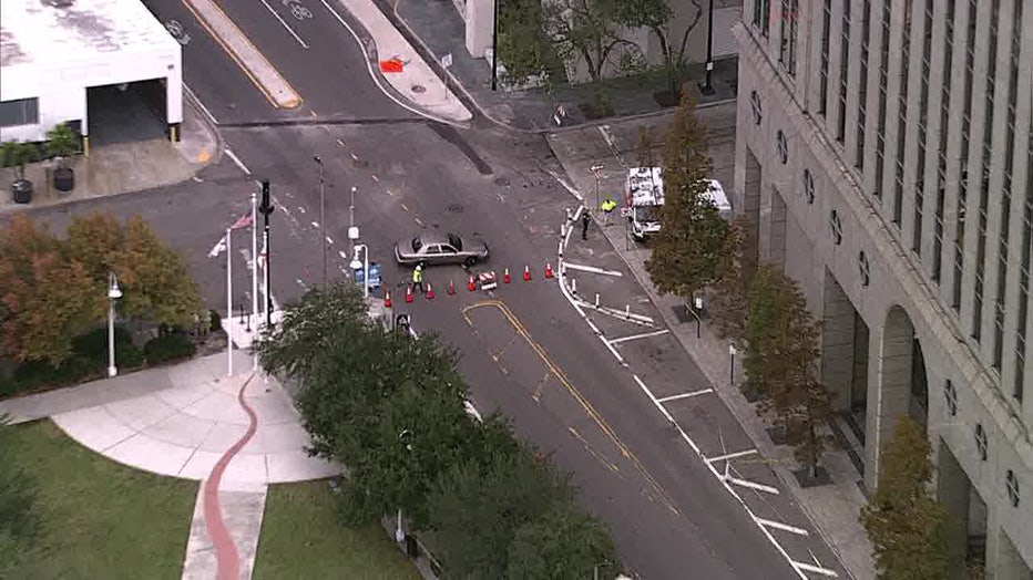 Portion of Ashley Drive and the sidewalk closed after Regions Bank window shattered.