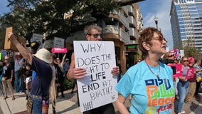 Pro-choice and pro-life activists mark 1st anniversary of Roe v. Wade since landmark decision was overturned