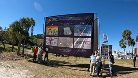 Crews install large murals ahead of 20th 'Embracing Our Differences' exhibit in Sarasota