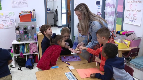 Unusual class pet helps kindergarten students learn responsibility, academic lessons