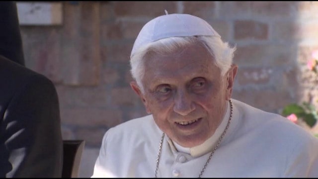 Mourners pay final respects to Pope Benedict XVI as he lies in state at the Vatican