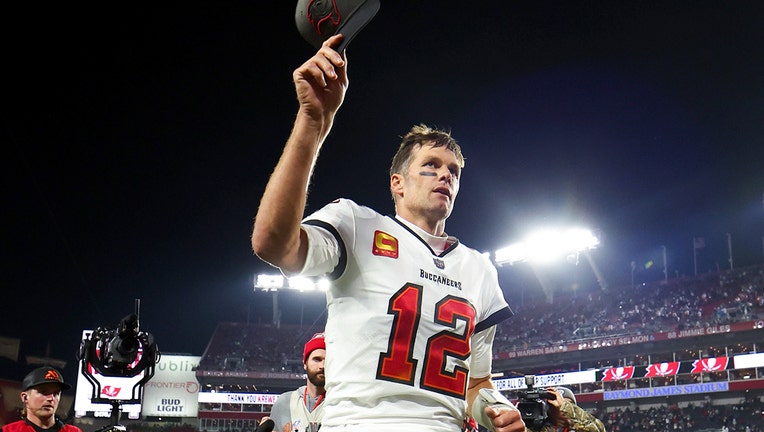 Tom Brady #12 of the Tampa Bay Buccaneers walks off the field after losing to the Dallas Cowboys 31-14 in the NFC Wild Card playoff game at Raymond James Stadium on January 16, 2023 in Tampa, Florida.