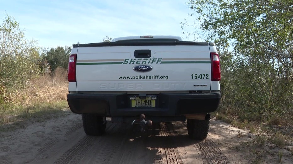 A Polk County Sheriff's office truck at an illegal dumping site. 