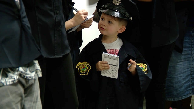 Clearwater kids — dressed in uniform — join police mentorship program to understand life as an officer