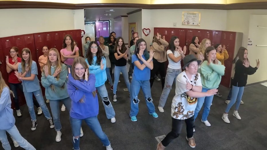 Students perform in Jennifer Posey's music video. 