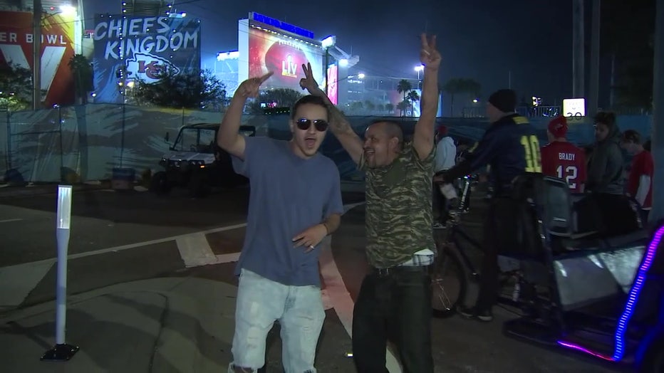 Fans cheer outside of Raymond James Stadium following a Buccaneers win in 2021. 