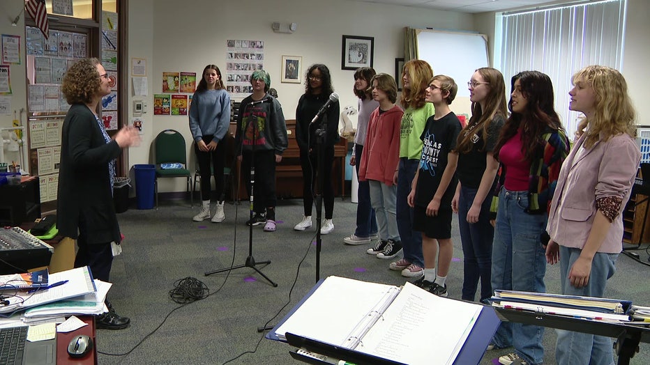 Students at Academie da Vinci Charter School for the Arts and Technology take part in a singing class. 