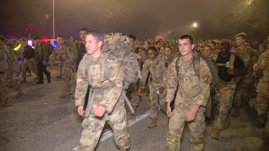 USF ROTC students are marching with ruck sacks full of food to Bay Area charities. 
