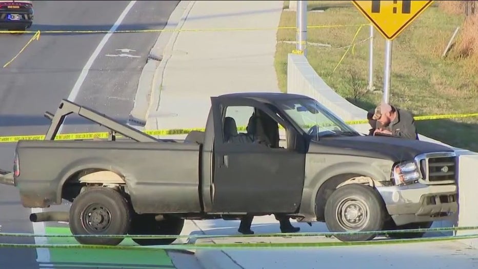 A truck with crime scene tape around it following a fatal shooting involving a state trooper.